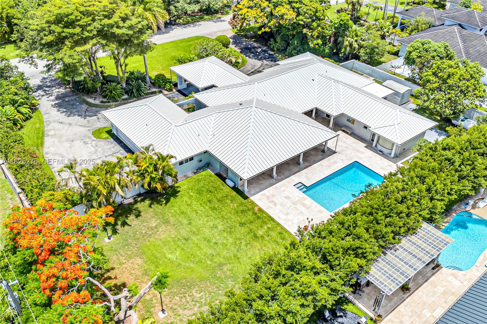 10563 Southwest 92nd Avenue Miami, FL 33176 - Photo 82 of 87 an aerial view of a house with a yard