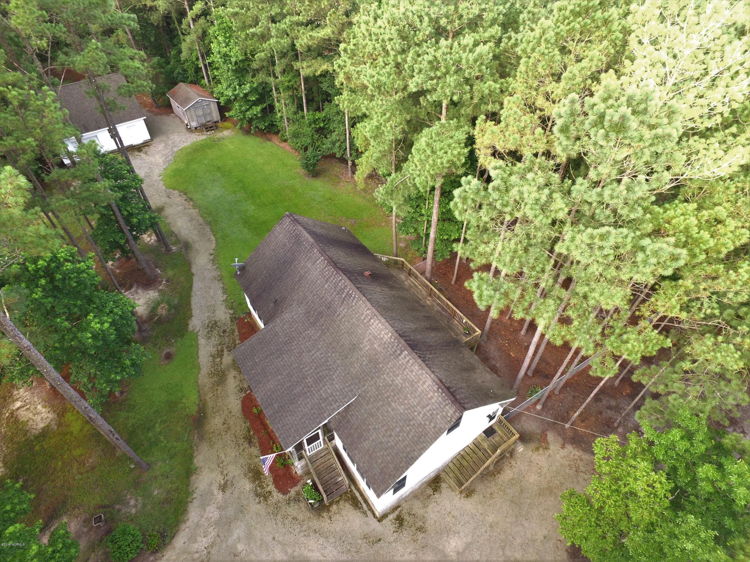 4601 Merrimon Road Beaufort, NC 28516 - Photo 33 of 39 Aerial of home, garage, shed
