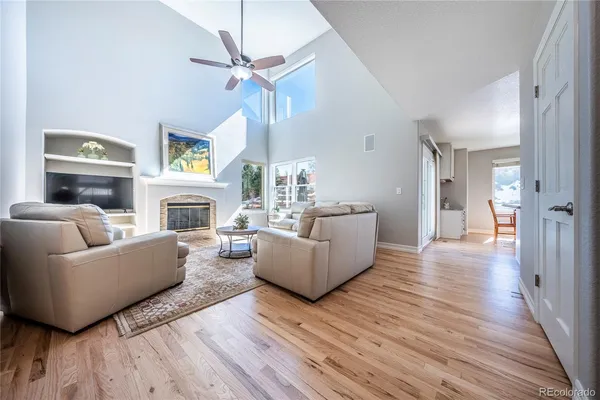 a living room with furniture and a rug