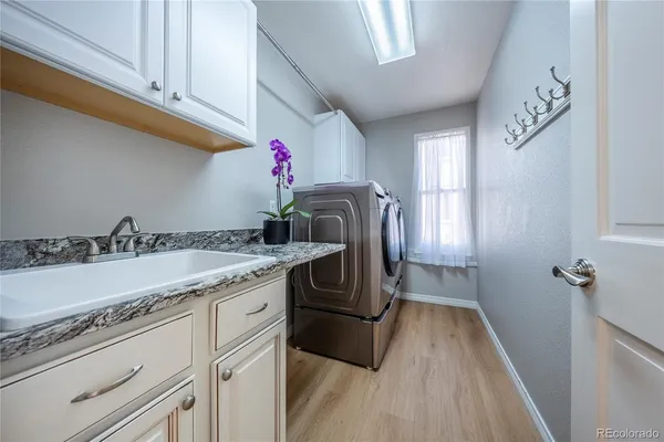 a view of a hallway view with staircase