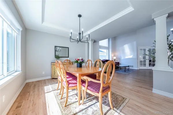 a kitchen with stainless steel appliances granite countertop a refrigerator and a stove