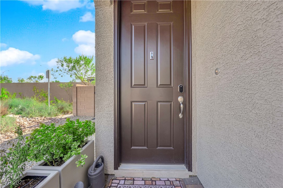 8719 Rio Andir Avenue Las Vegas, NV 89148 - Photo 3 of 50 Entrance