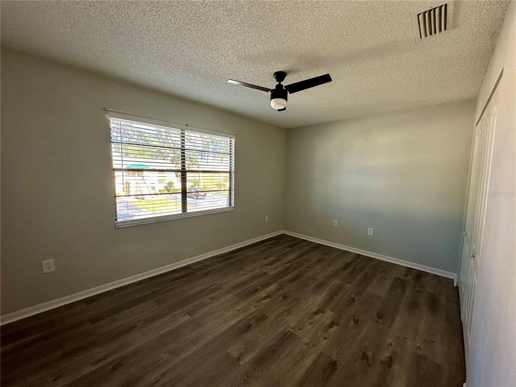 6104 Topher Trail, Unit 6104 Mulberry, FL 33860 - Photo 14 of 19 a view of an empty room with a window