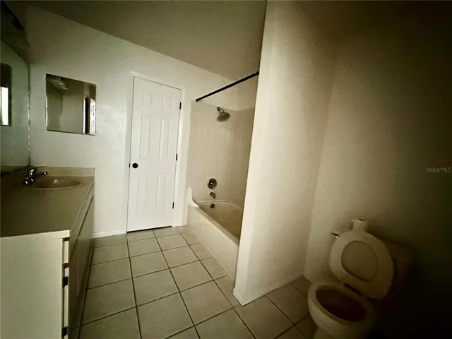 a bathroom with a sink and toilet