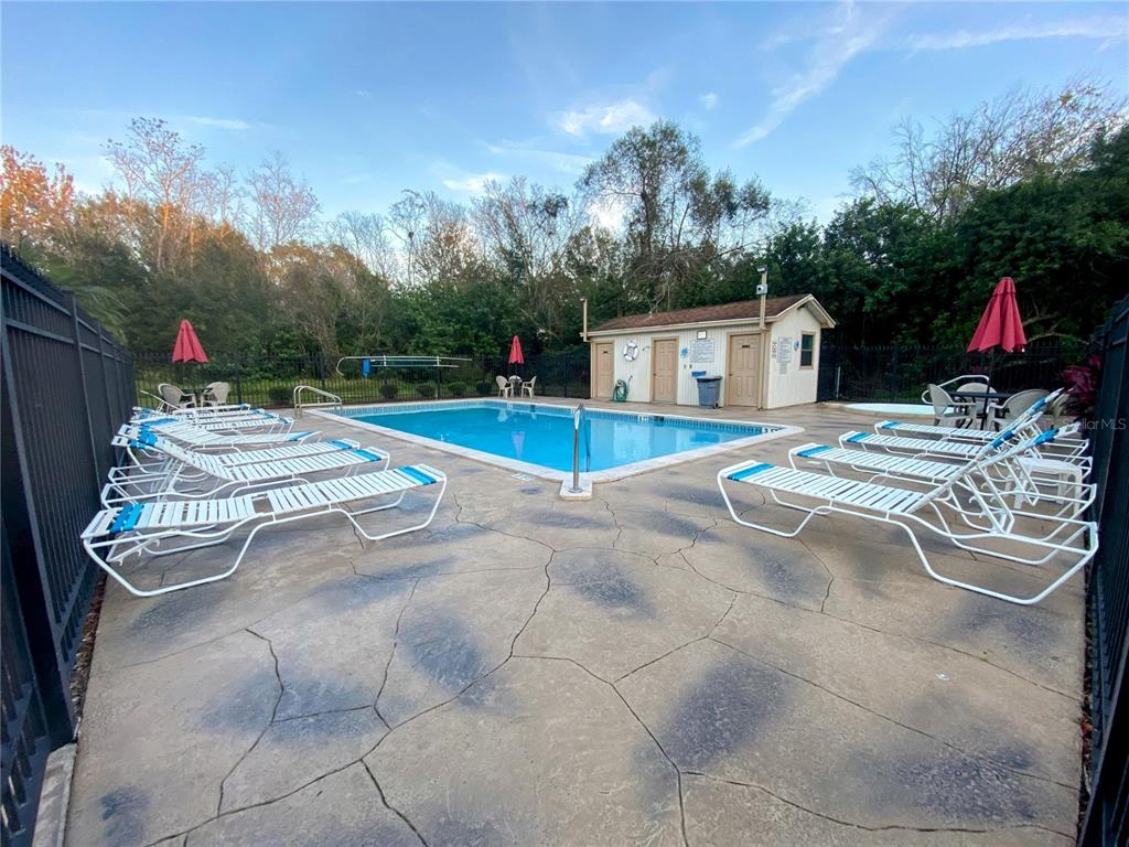 6104 Topher Trail, Unit 6104 Mulberry, FL 33860 - Photo 18 of 19 a view of back yard of the house