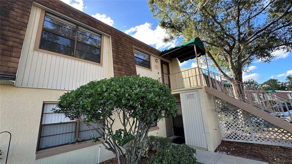 6104 Topher Trail, Unit 6104 Mulberry, FL 33860 - Photo 2 of 19 a house view with a garden space