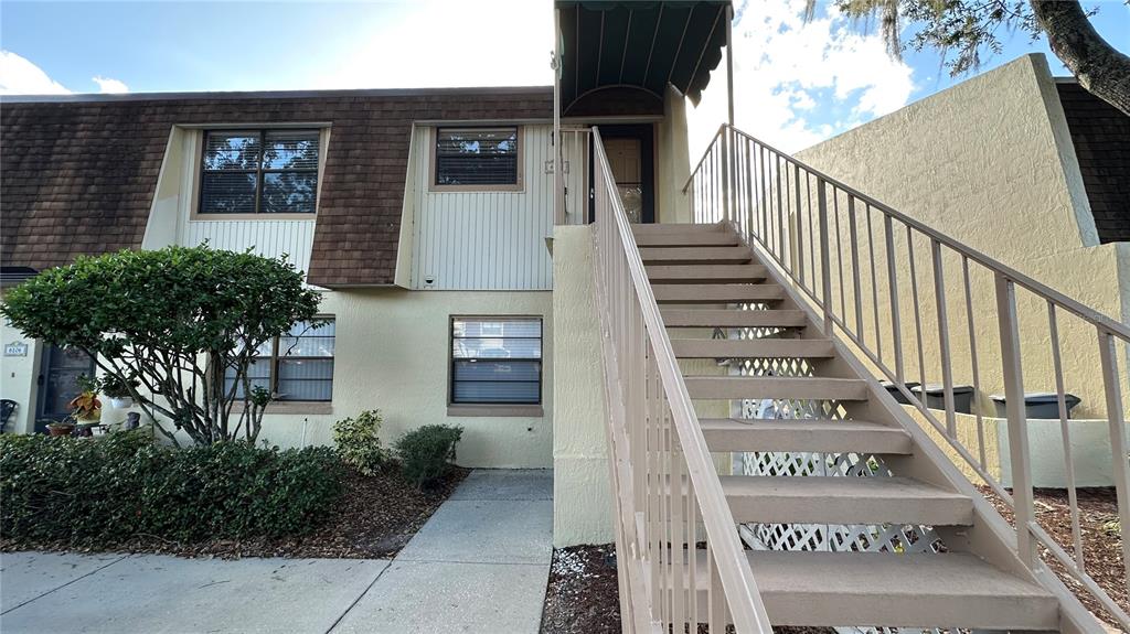 6104 Topher Trail, Unit 6104 Mulberry, FL 33860 - Photo 4 of 19 a view of a building with stairs