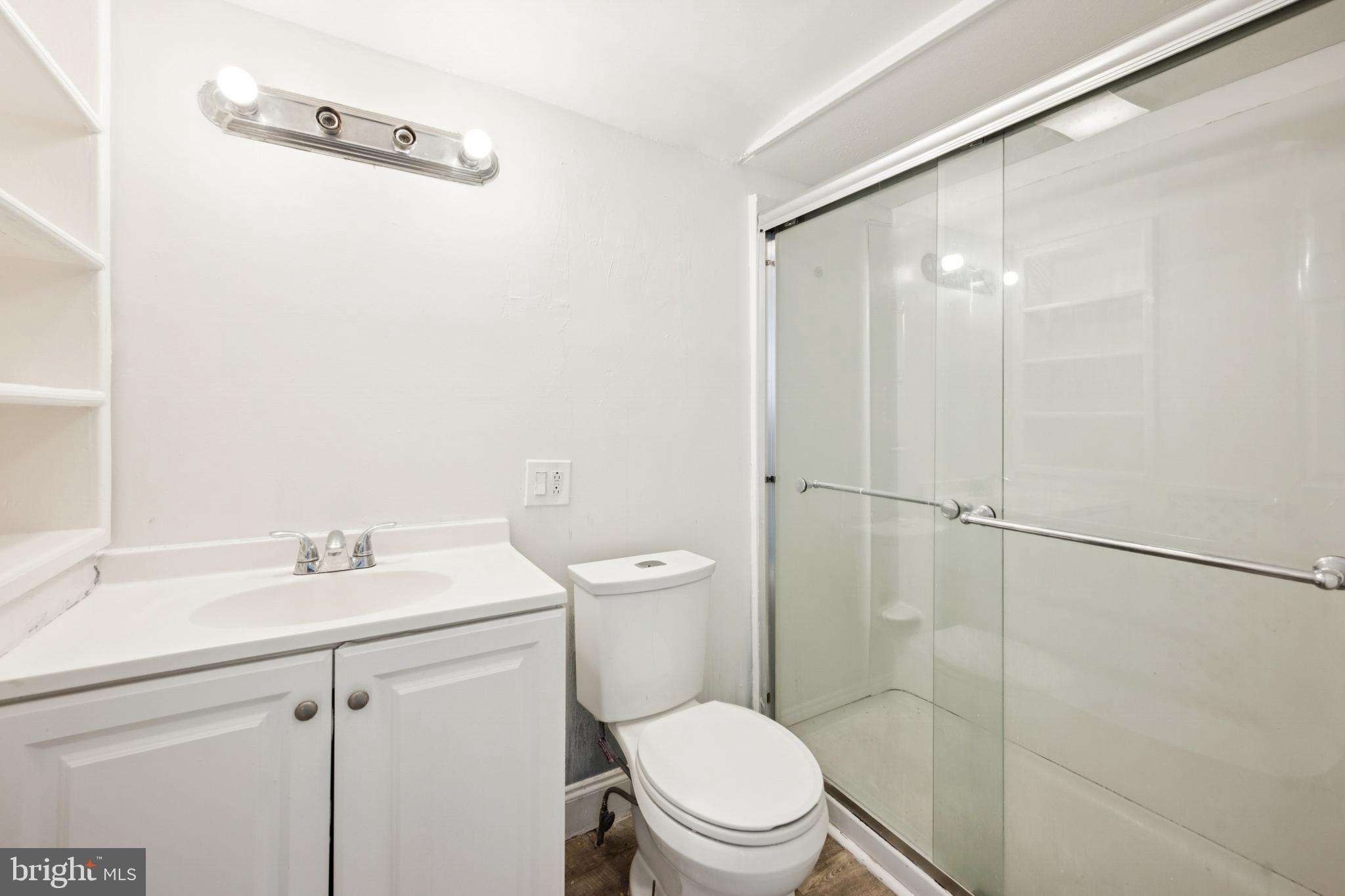 506 Bridgeboro Street Riverside, NJ 08075 - Photo 15 of 26 a bathroom with a sink a toilet and shower