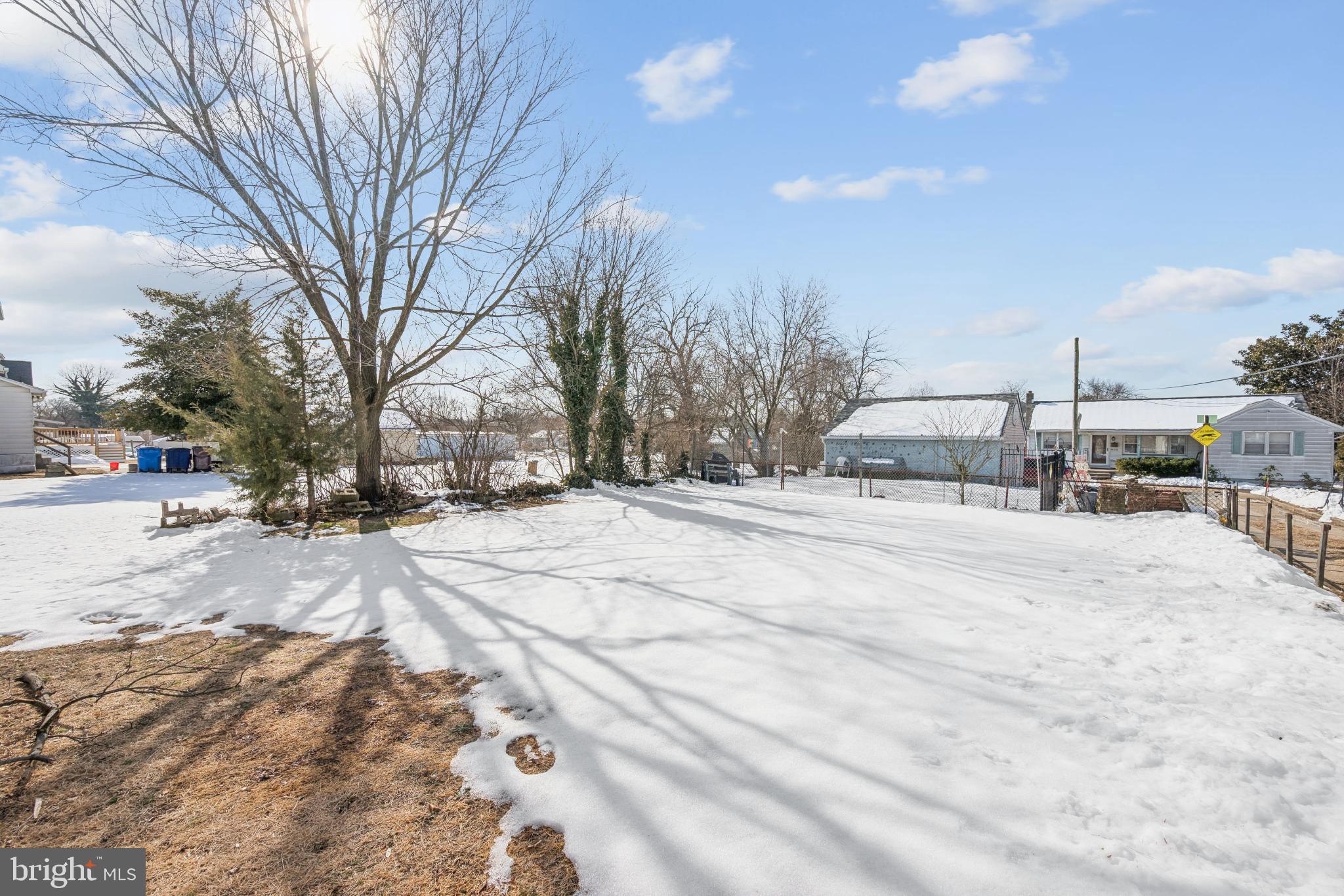 506 Bridgeboro Street Riverside, NJ 08075 - Photo 25 of 26 a view of road with a snow on the road
