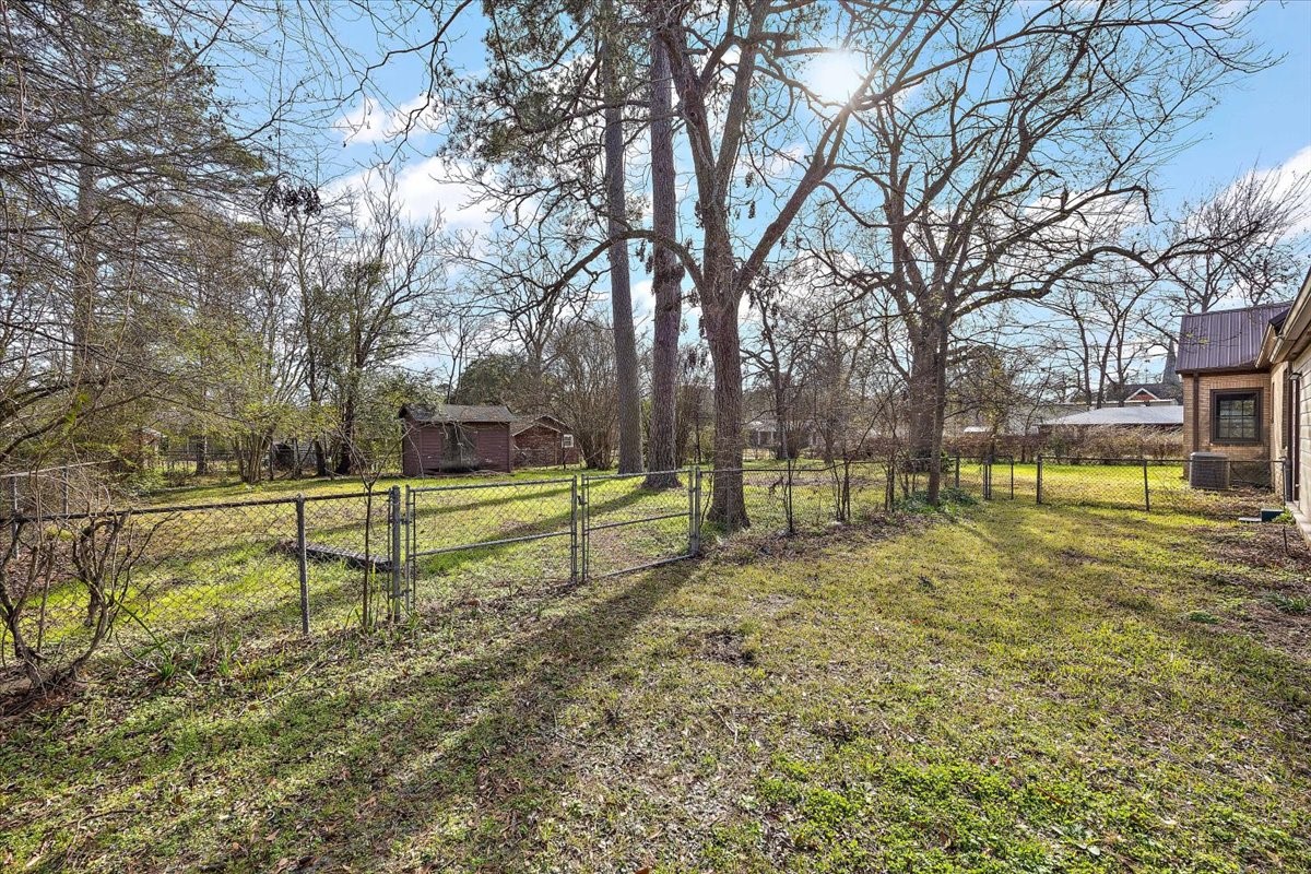 370 Austin Street Timpson, TX 75975 - Photo 28 of 30 a view of backyard with swimming pool