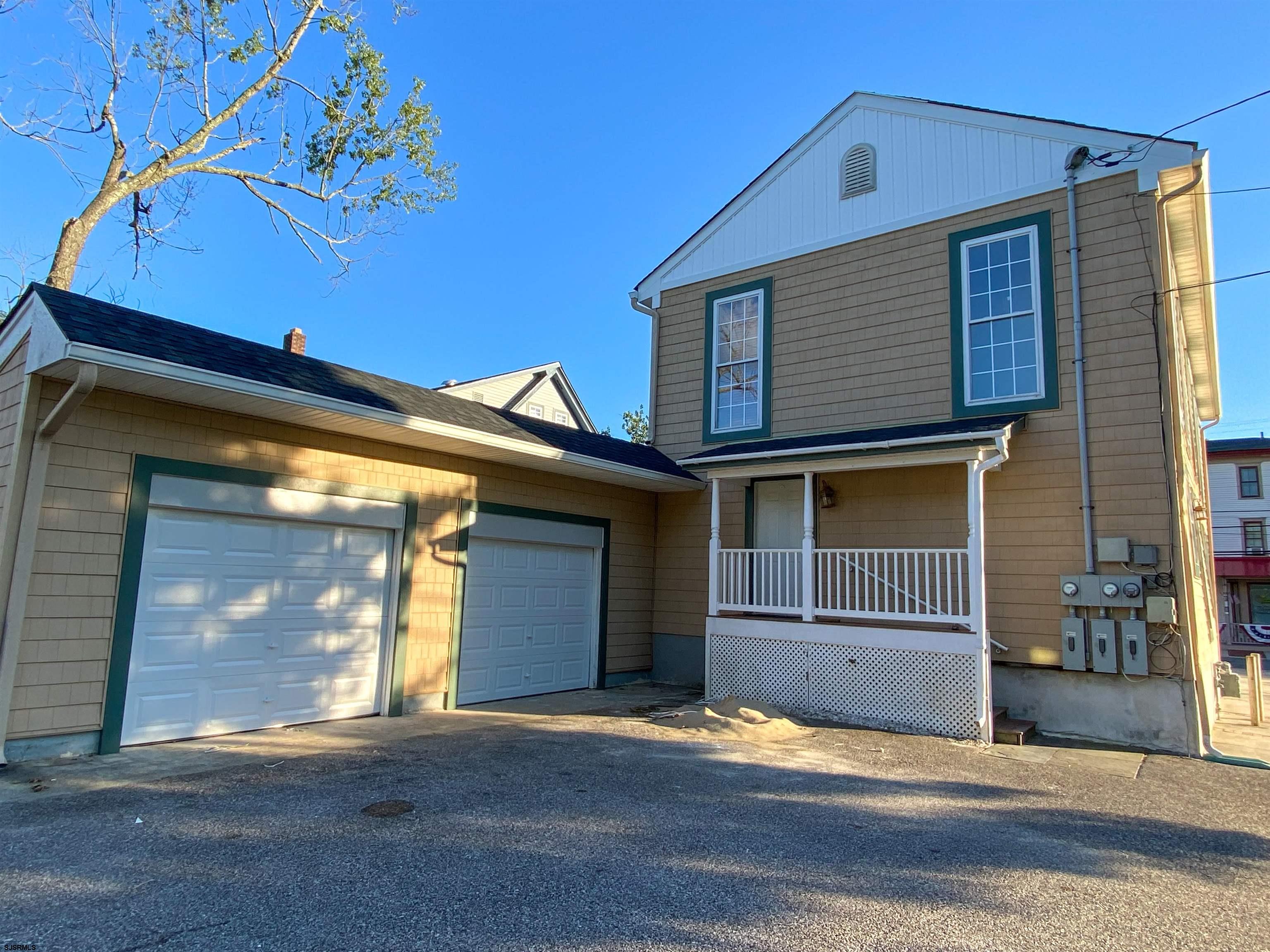 a view of a house with a garage