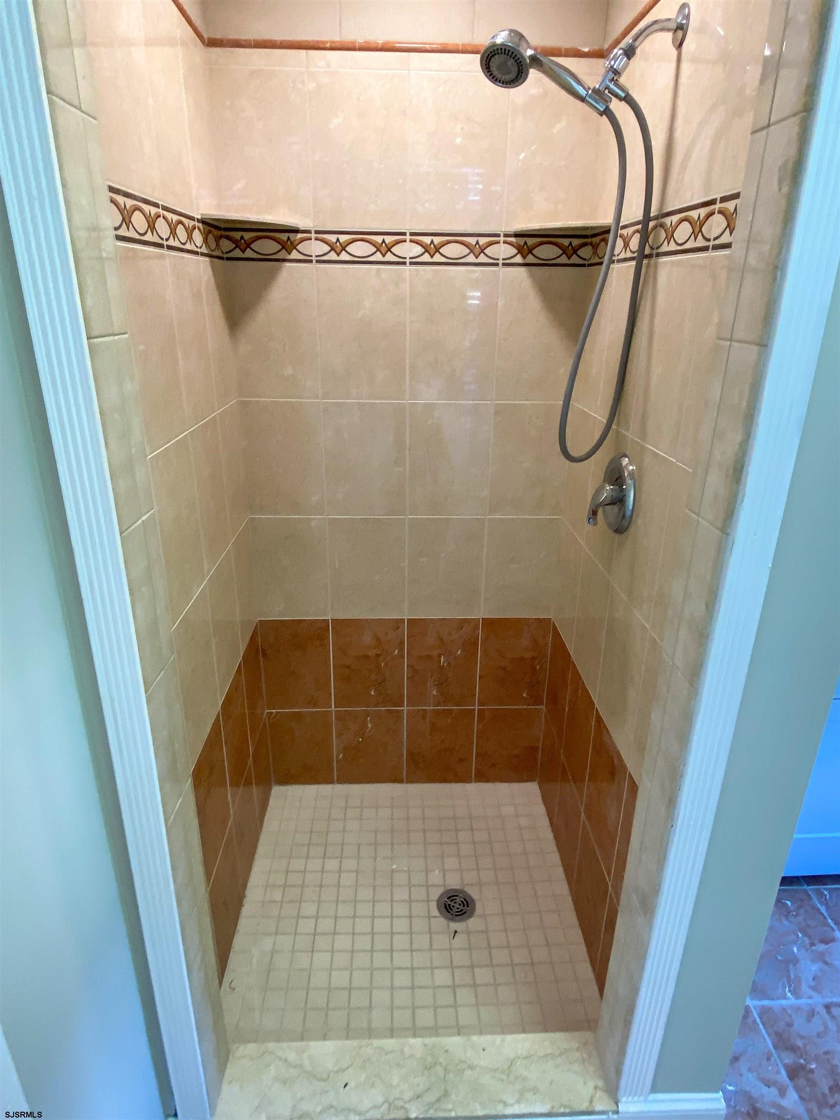 6019 Main Street, Unit 2 Mays Landing, NJ 08330 - Photo 21 of 26 a bathroom with a shower