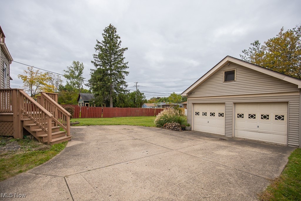 7070 Ridge Road Parma, OH 44129 - Photo 26 of 28 Garage with a yard