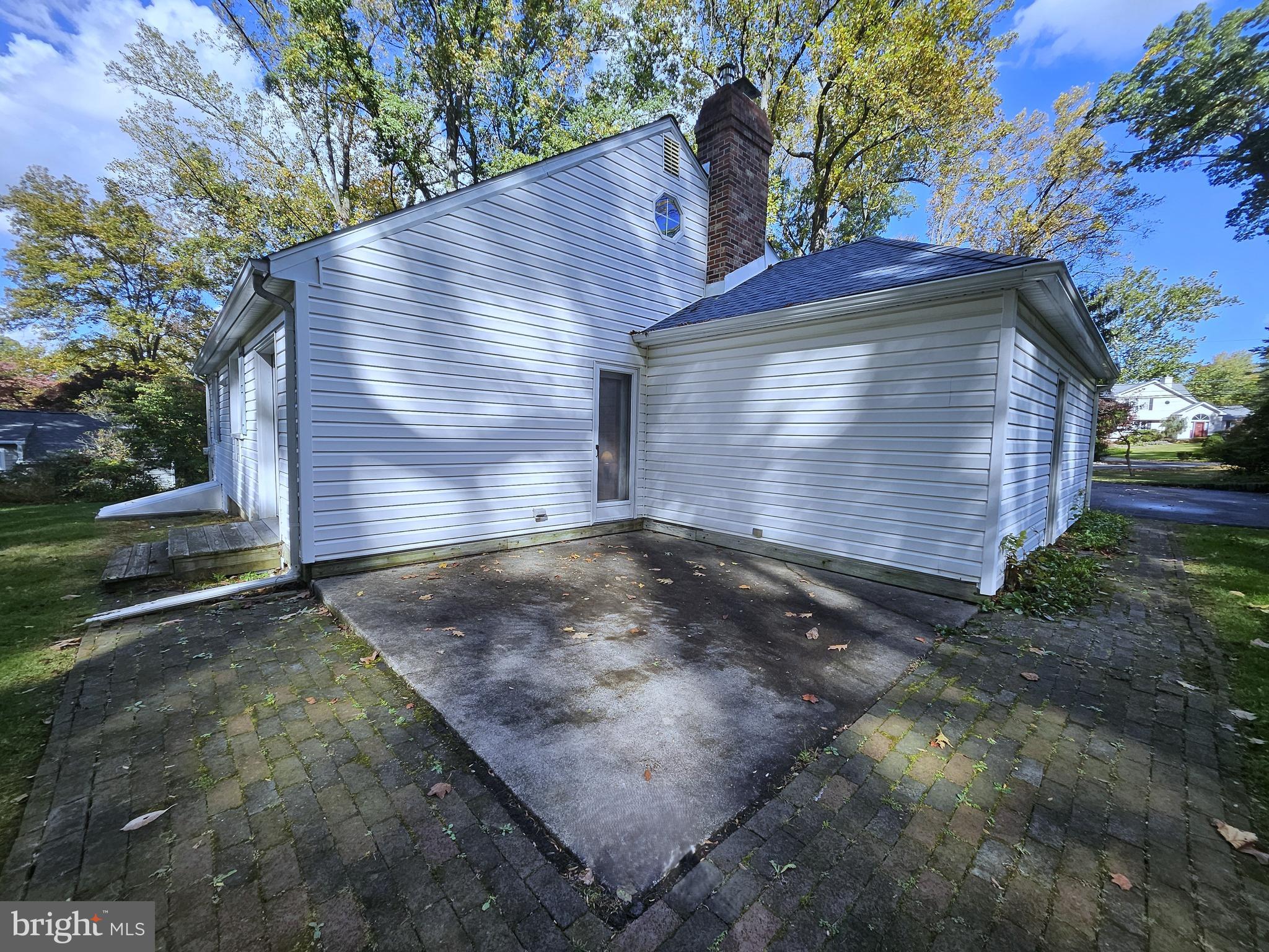 260 Brae Bourn Road Huntingdon Valley, PA 19006 - Photo 54 of 57 Rear Corner with Door from Dining Area to Patio