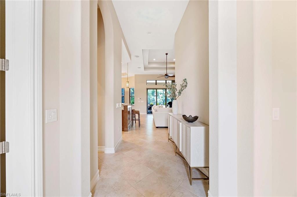6255 Brunello Lane Naples, FL 34113 - Photo 5 of 37 a view of a living room with furniture