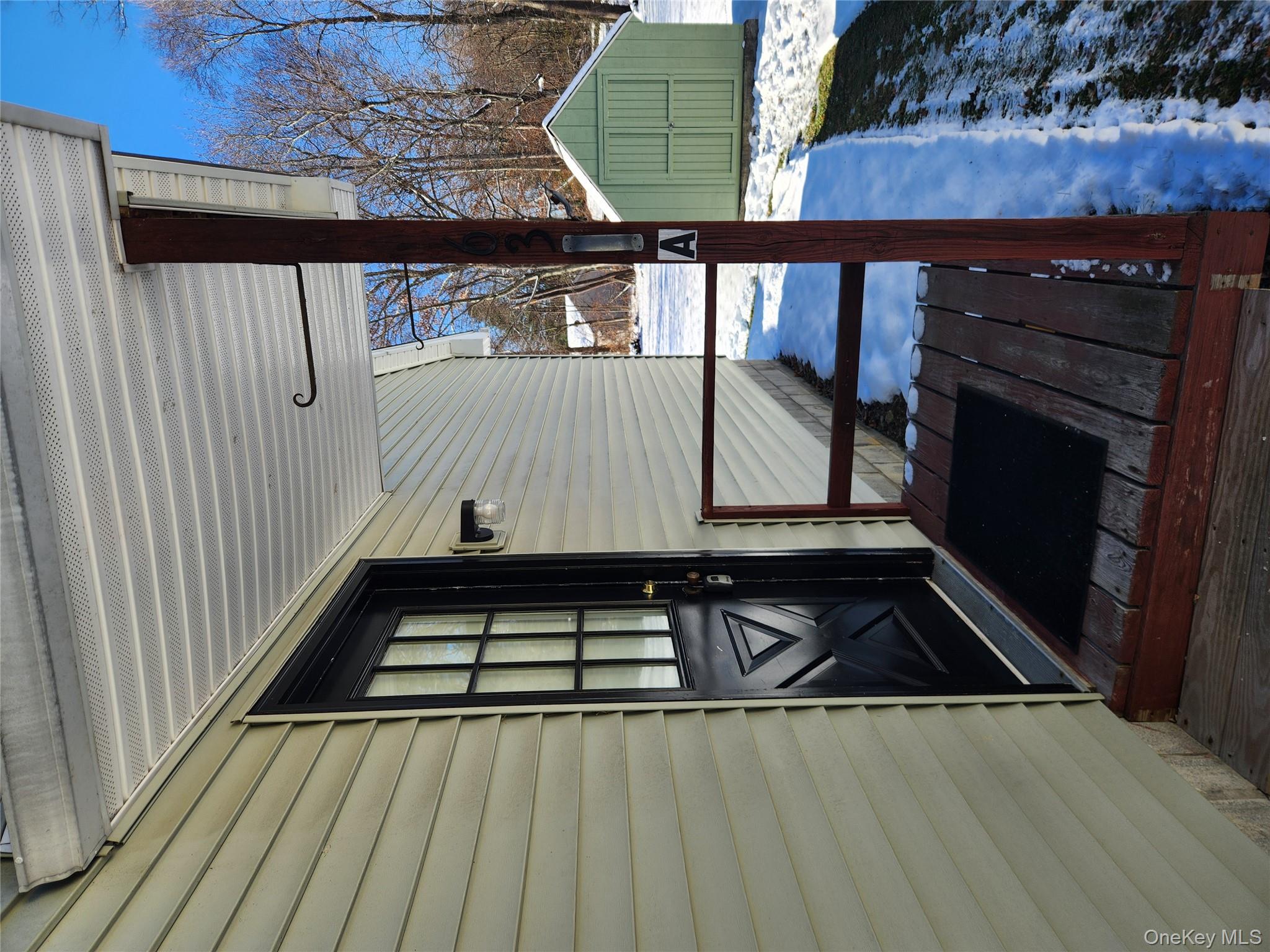 63 Jefferson Road, Unit A Red Hook, NY 12571 - Photo 11 of 13 a view of a house with a door and wooden floor