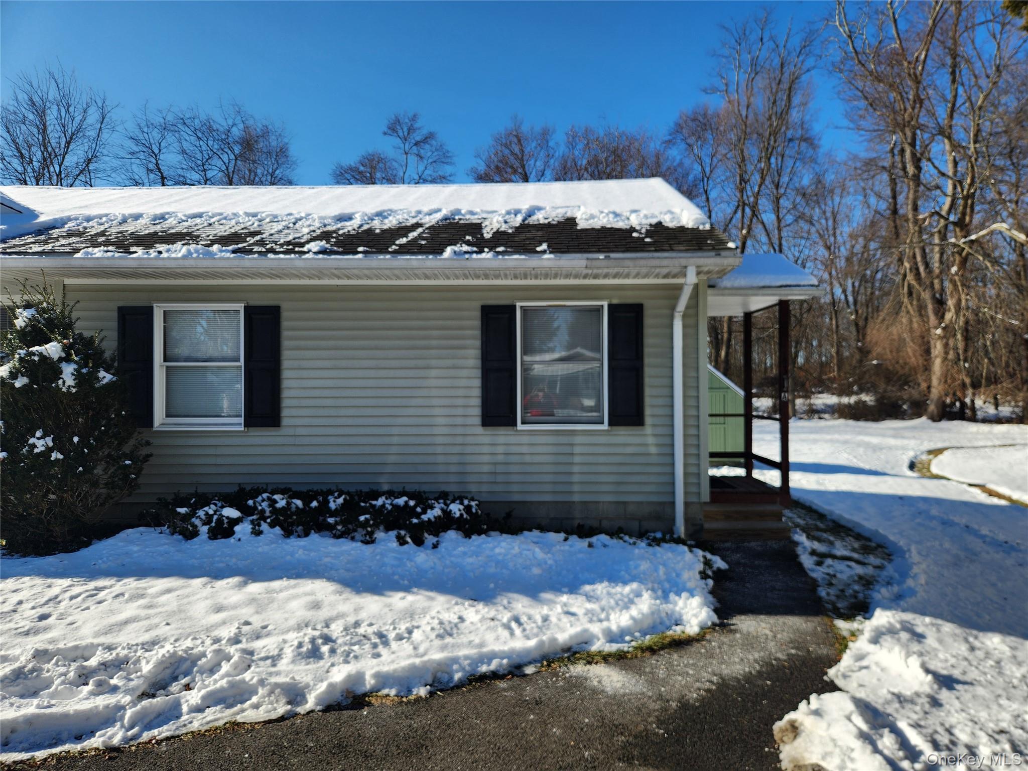 63 Jefferson Road, Unit A Red Hook, NY 12571 - Photo 2 of 13 a view of a house with a yard