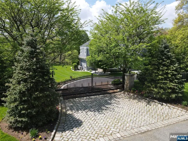 a view of a pathway with a yard
