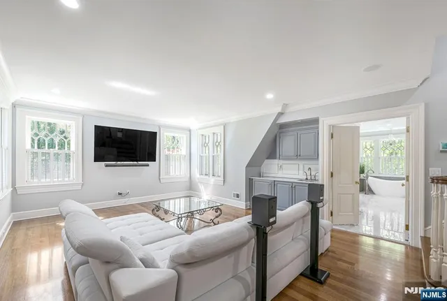 a bedroom with a bed and a fireplace