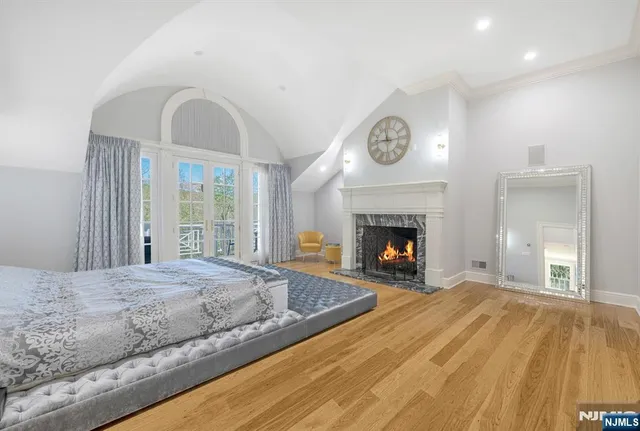 a bathroom with a double vanity sink toilet and a shower
