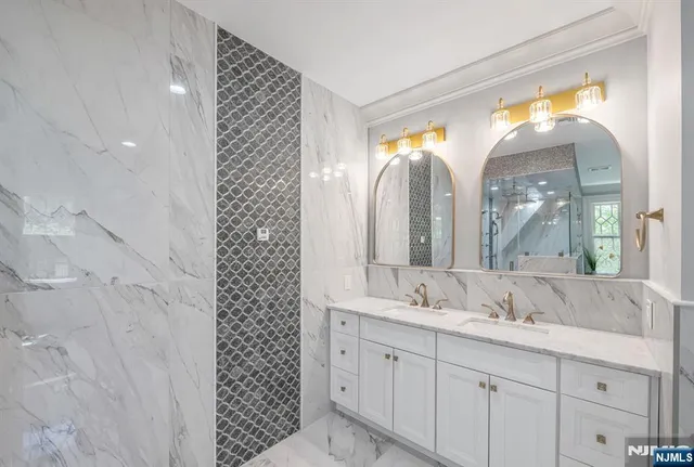 a spacious bedroom with a bed and a large window