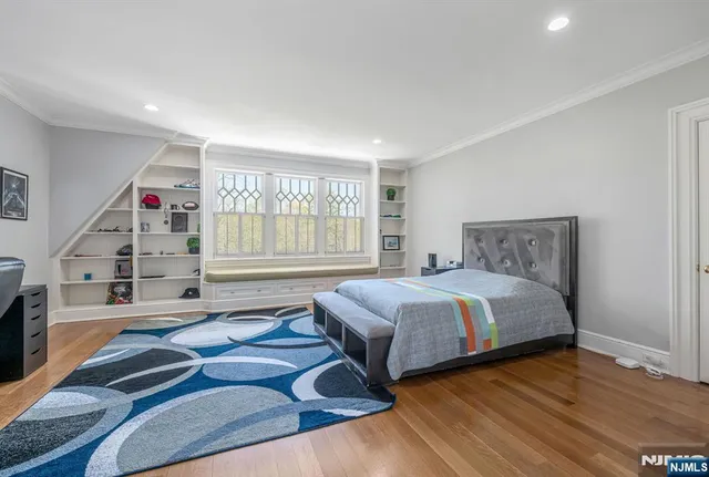 a bathroom with a double vanity sink mirror and shower