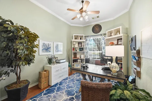 a living room with furniture and decor