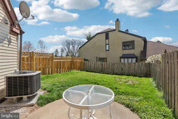 a view of a back yard of the house