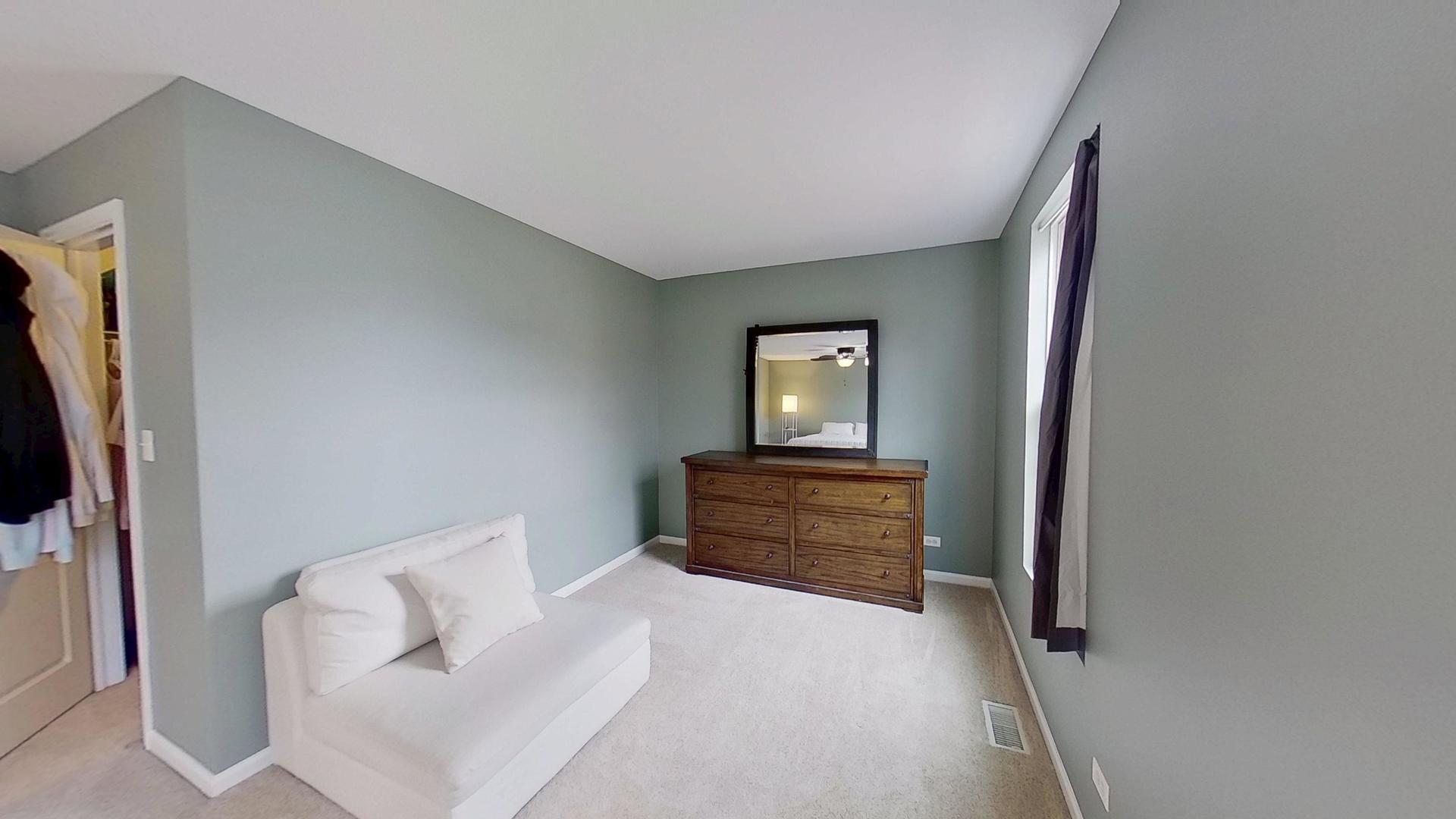 2418 Emily Lane Elgin, IL 60124 - Photo 12 of 27 a bedroom with a bed and a television