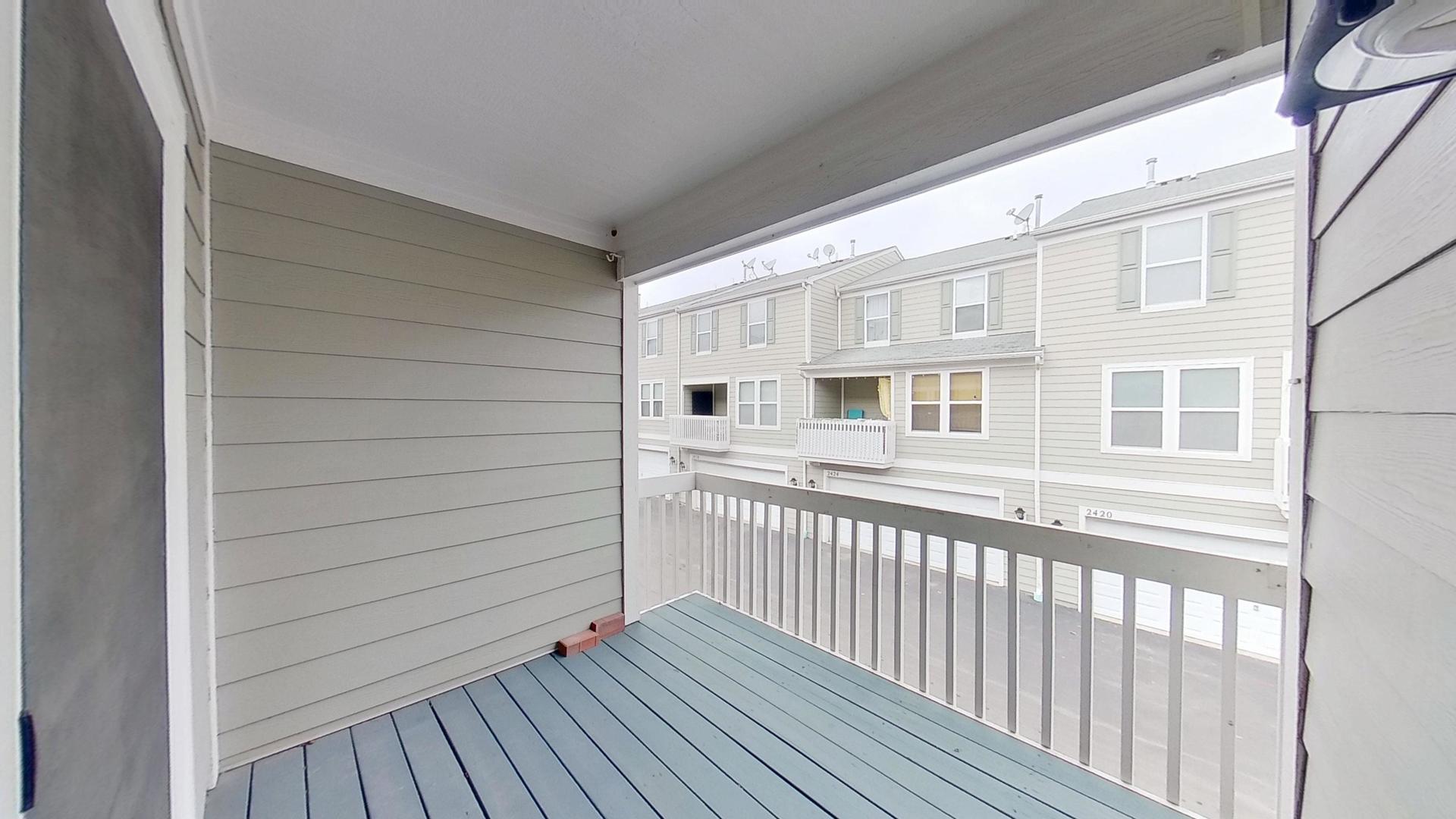 2418 Emily Lane Elgin, IL 60124 - Photo 24 of 27 a view of a house with wooden floor