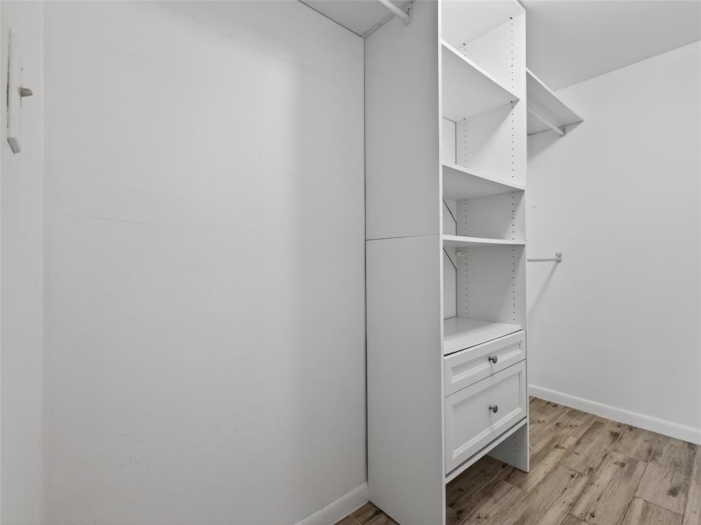 8400 West Sample Road, Unit 203 Coral Springs, FL 33065 - Photo 18 of 26 a room with walk in closet and closet