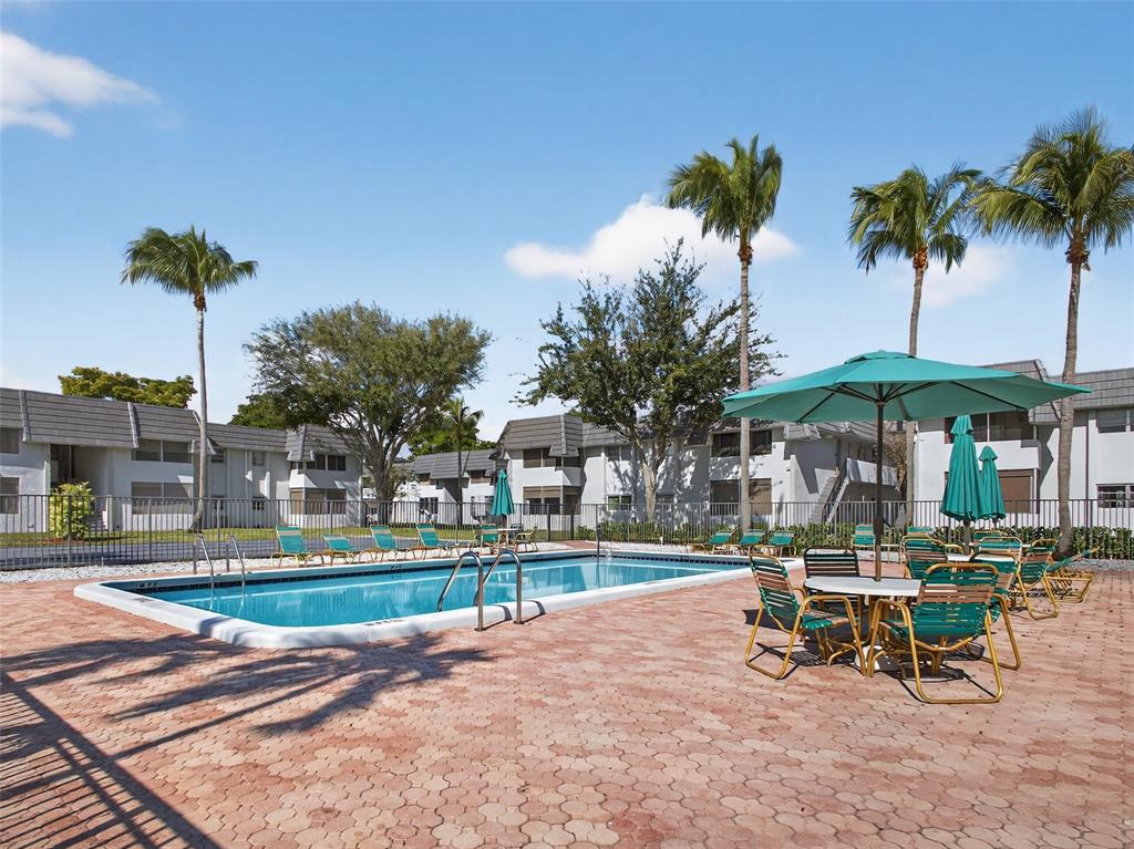 8400 West Sample Road, Unit 203 Coral Springs, FL 33065 - Photo 23 of 26 a view of a child park