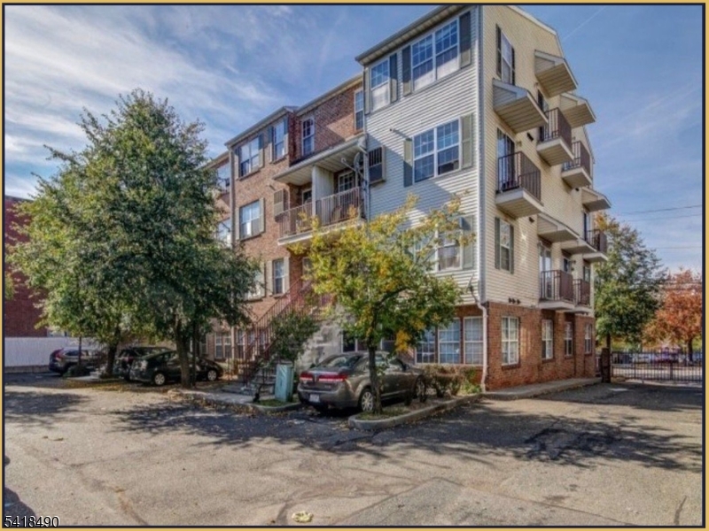 84 Union Street, Unit C2 Newark, NJ 07105 - Photo 1 of 13 a view of a building with a street