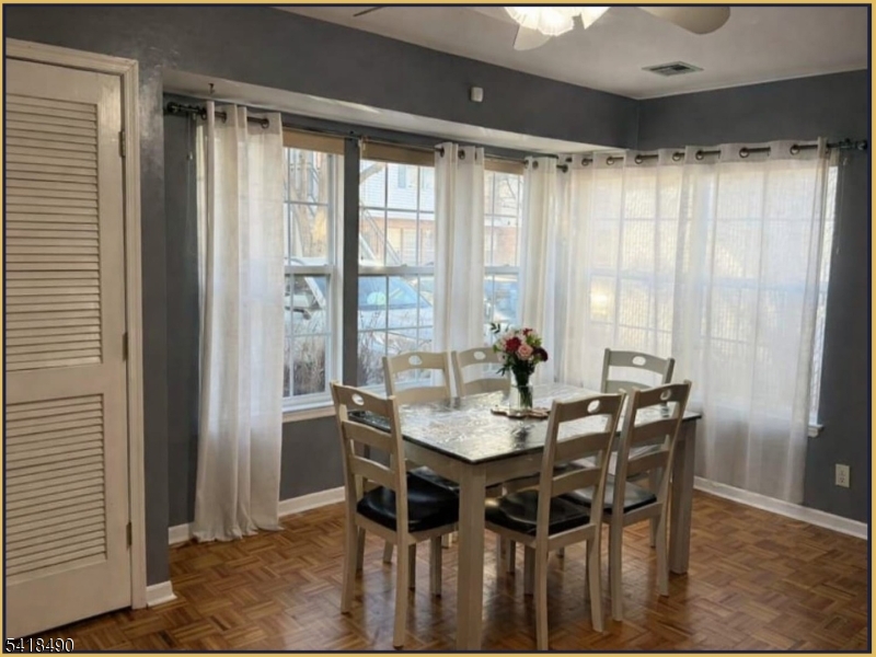 84 Union Street, Unit C2 Newark, NJ 07105 - Photo 5 of 13 a view of a dining room with furniture and window