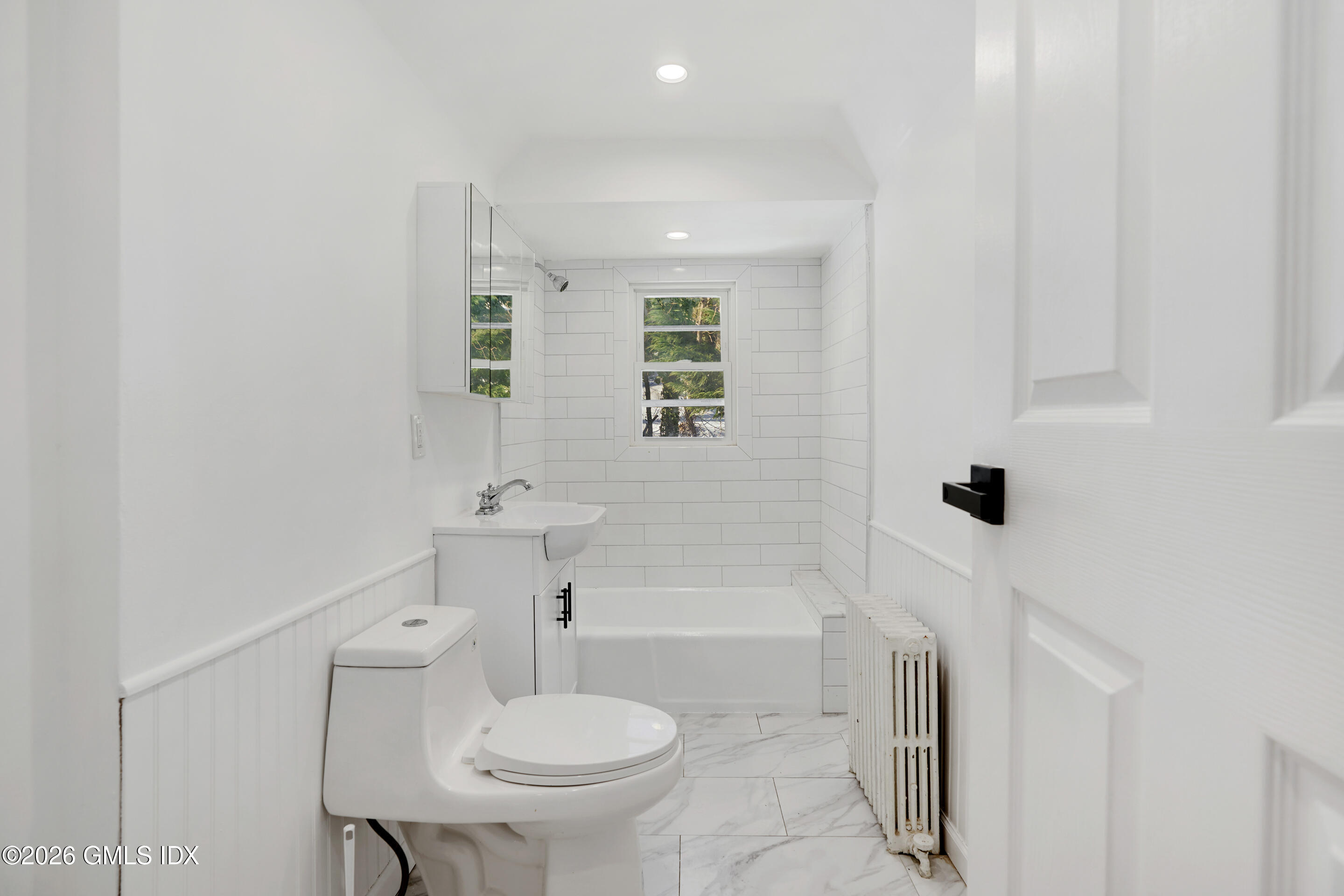 212 Davis Avenue, Unit B Greenwich, CT 06830 - Photo 10 of 10 a bathroom with a sink toilet and shower