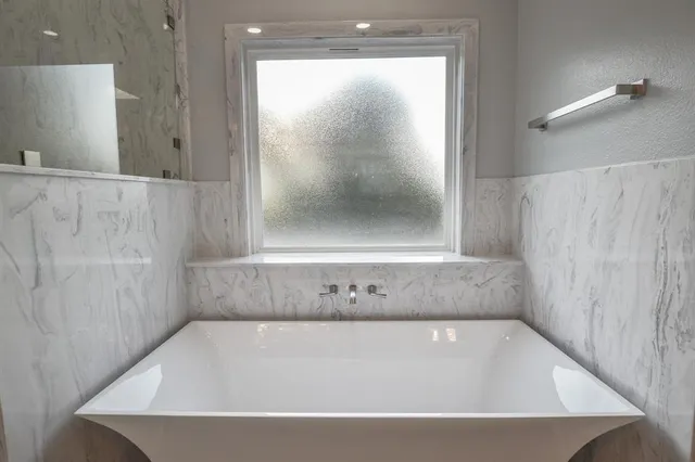 a bathroom with a bathtub
