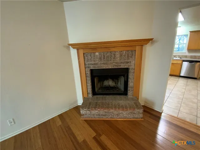 a living room with a fireplace