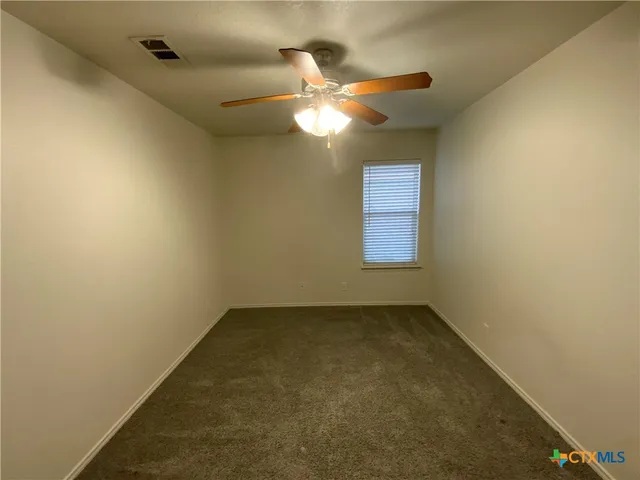 a view of empty room with window