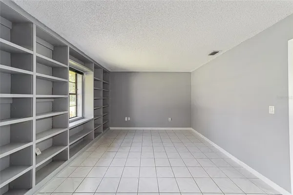 a view of an empty room with empty racks