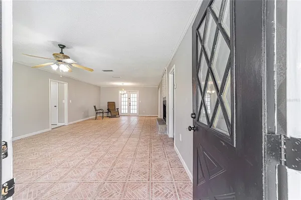 a view of a hallway to a bedroom