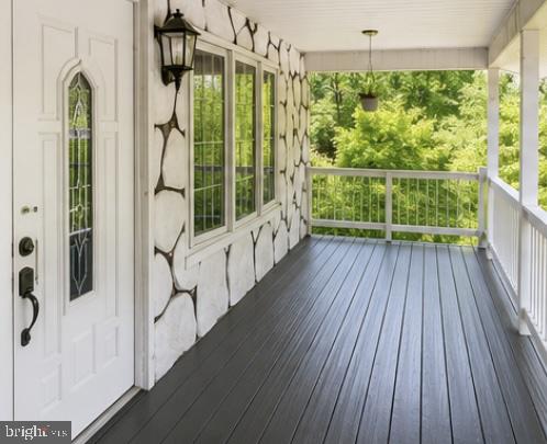 272 Neyhart Road Stroudsburg, PA 18360 - Photo 2 of 5 Charming porch with scenic views.