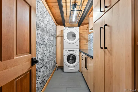 a view of a hallway with washer and dryer