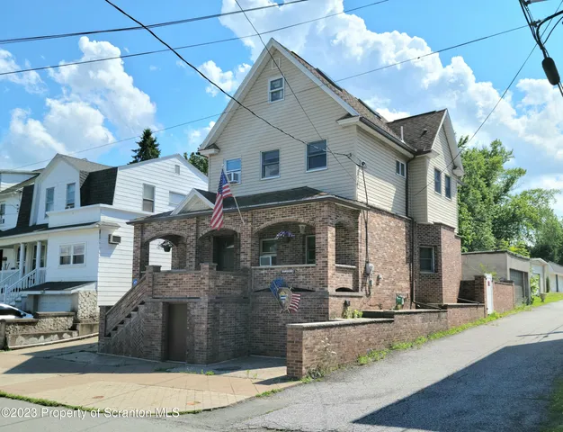 a front view of a house with entertaining space