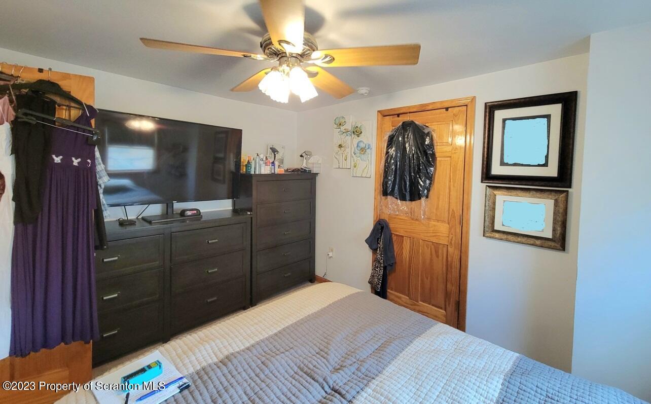 1620 Myrtle Street Scranton, PA 18510 - Photo 22 of 29 a bedroom with a bed and a television