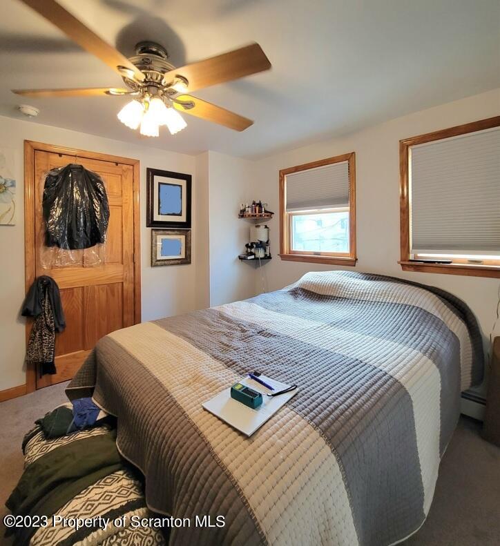 1620 Myrtle Street Scranton, PA 18510 - Photo 24 of 29 a bedroom with a bed and a flat screen tv