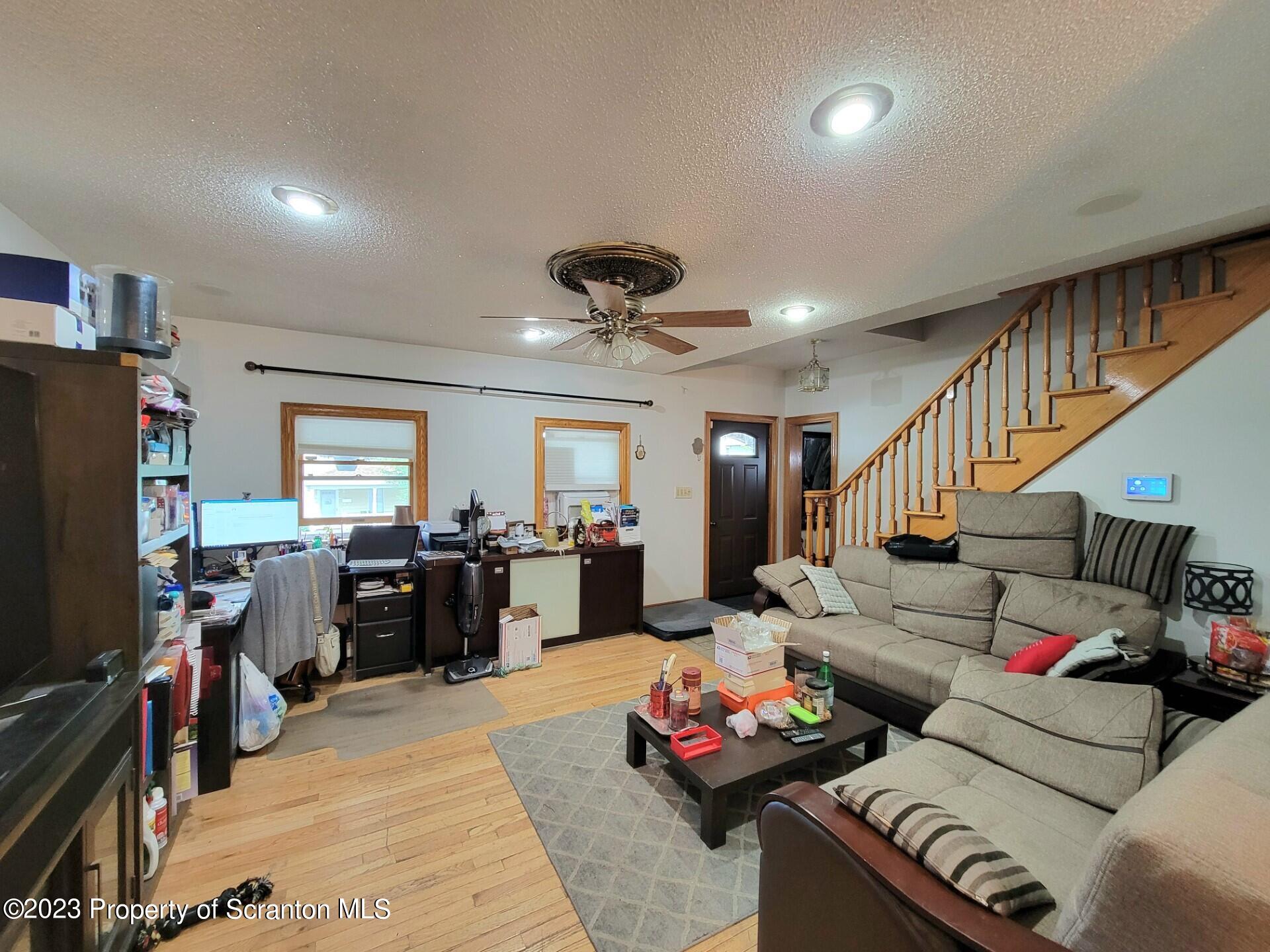 1620 Myrtle Street Scranton, PA 18510 - Photo 7 of 29 a living room with furniture and a flat screen tv