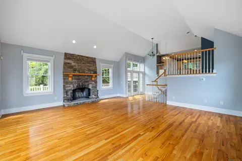 a view of livingroom with window and fireplace