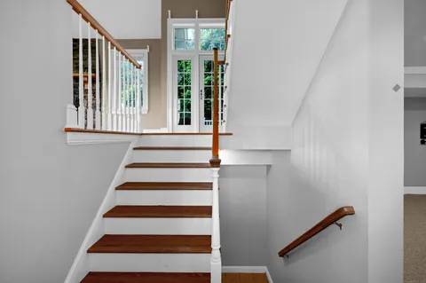 a view of entryway with a front door