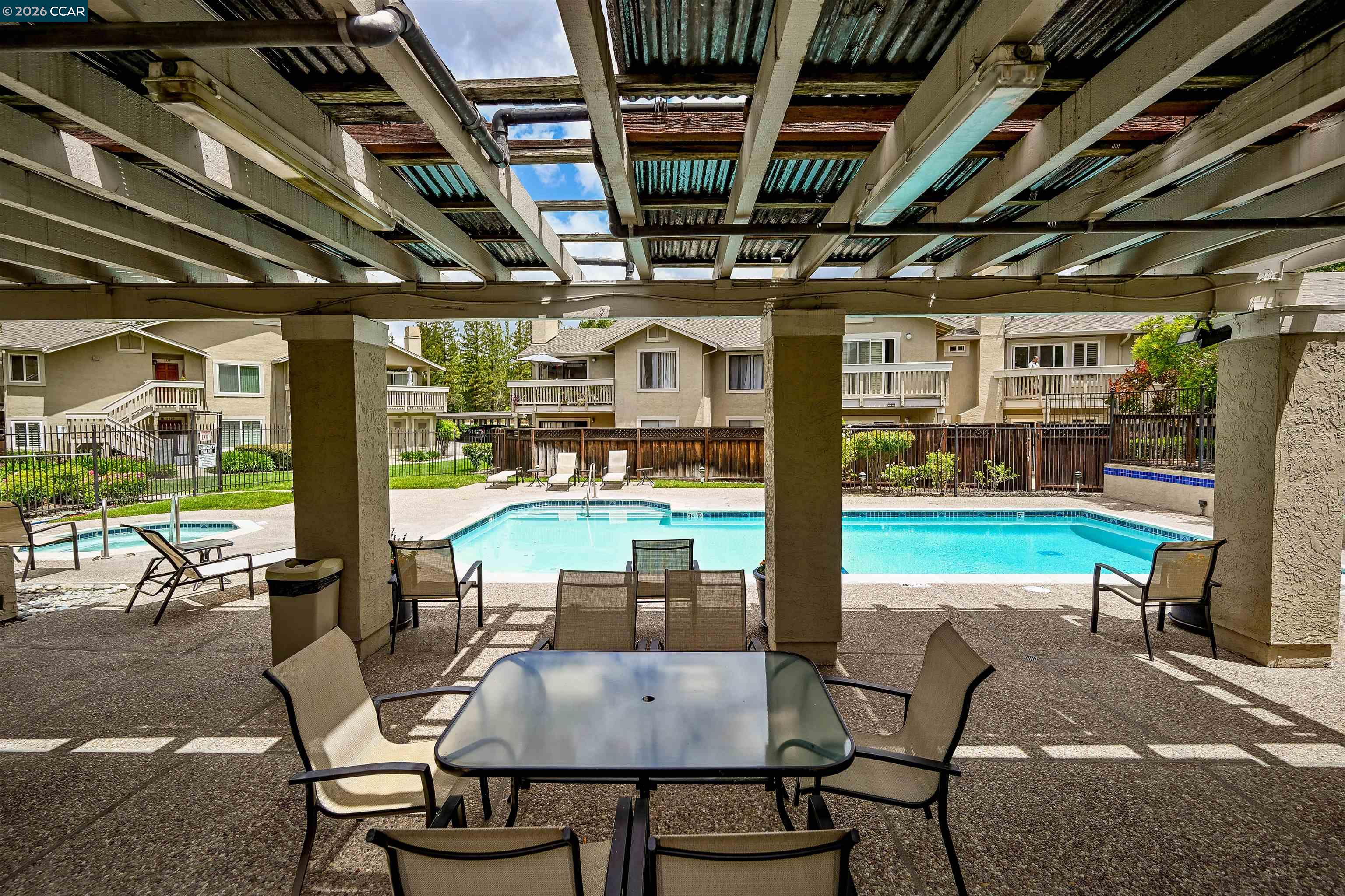3659 Crow Canyon Road San Ramon, CA 94582 - Photo 15 of 26 a roof deck with table and chairs a barbeque with potted plants and a barbeque grill with a yard