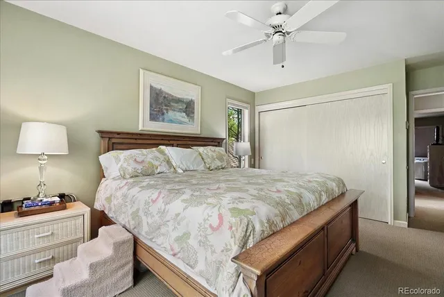 a bedroom with bed and window